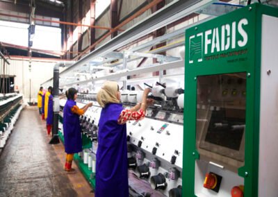 Fadis: In Fadis machine we can control the length of the package as per desired length with equal density, Fadis soft winder is origin from Italy; FADIS m/c the electronic yarn guide technology with precision crossing is the only system that allows carrying out the winding process keeping the yarn’s quality characteristics unchanged.